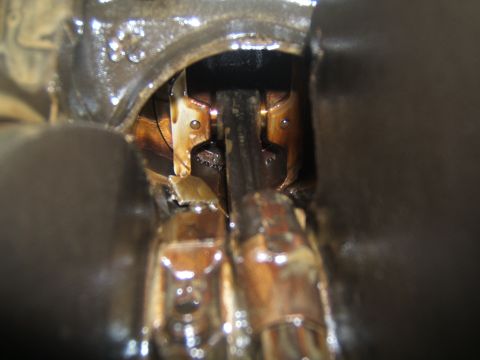 1988 Ford Bronco - Internal engine components, likely pistons and connecting rods, are visible in this close-up view.