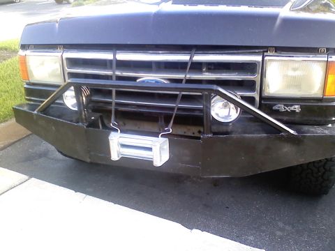 1990 Ford Bronco - This 1990 Ford Bronco features a custom brush guard and winch mounted on the front bumper.