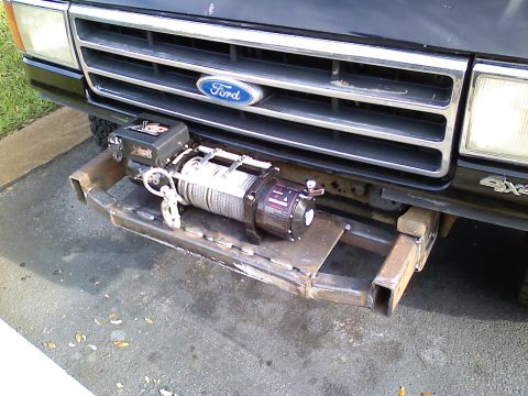 1990 Ford Bronco - Front view of a 1990 Ford Bronco equipped with a winch and a custom brushguard.