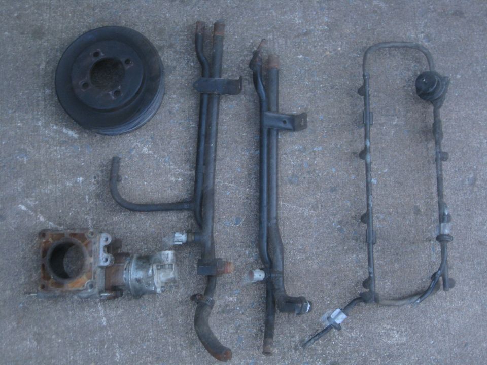 crown vic water pump pulley
egr spacer
coolant passages
fuel rail