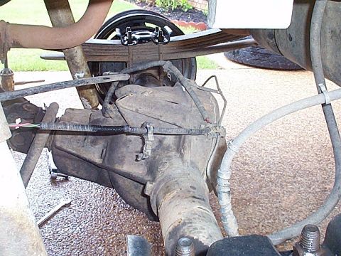 1983 Ford Bronco - The nuts on the U-bolts are soaking in Liquid Wrench (or some other penetrating oil). I washed all the dirt off a few days ago & then kept…