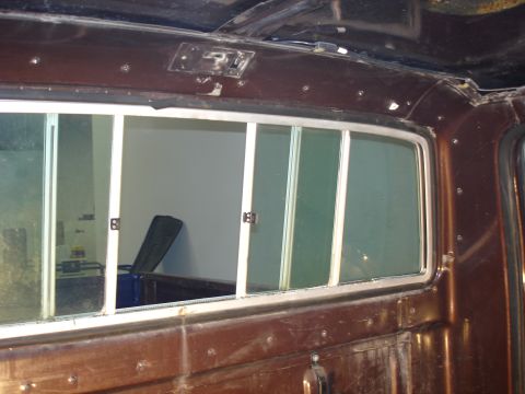 1979 Ford F-250 - The interior of a truck's cab shows the rear window and a glimpse of the bed.