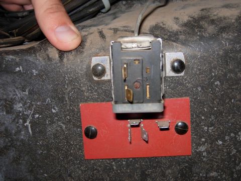 1970 Ford Ranchero - Close-up of a heater blower motor relay, possibly for an A/C and heater project, mounted on a red bracket.