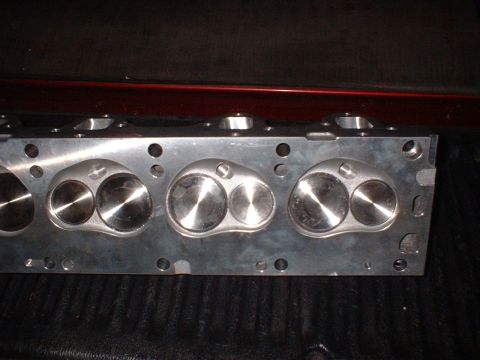 1968 Ford Galaxie - Close-up of an engine cylinder head, showing its internal components and construction.