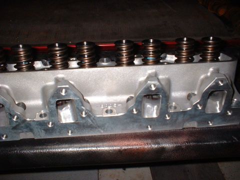 1968 Ford Galaxie - Close-up view of an engine cylinder head, showing multiple valve springs.