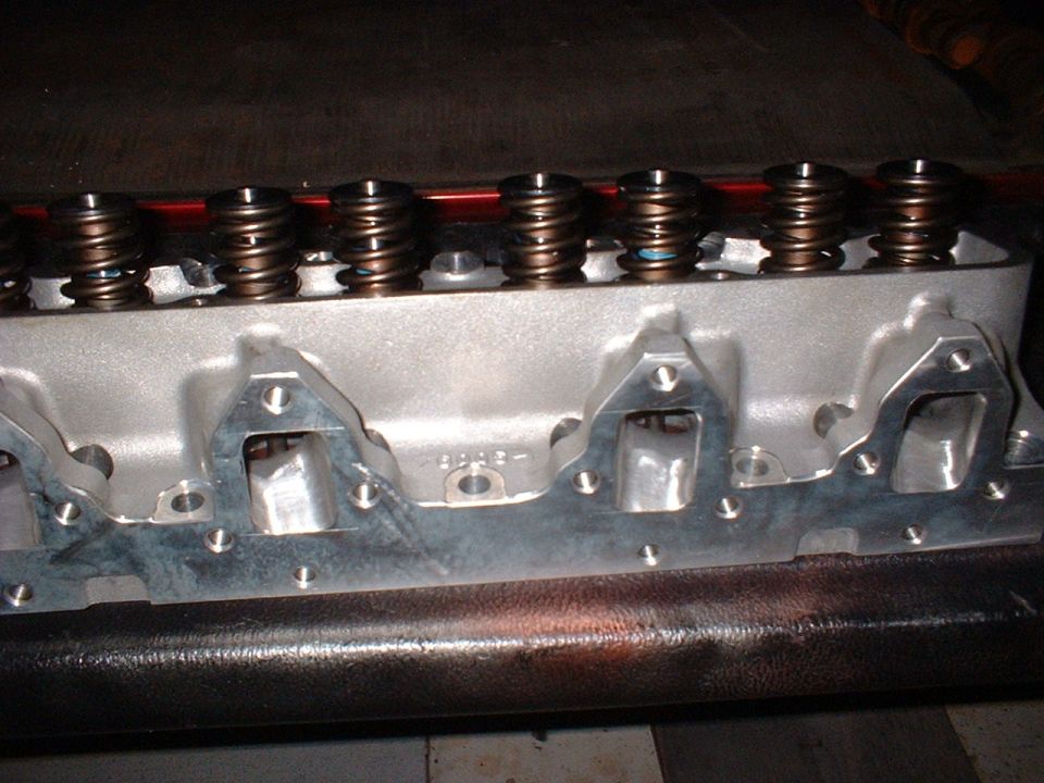 Engine cylinder head with valve springs visible
