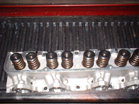 1968 Ford Galaxie - Close-up of an aluminum engine cylinder head, showing multiple valve springs.