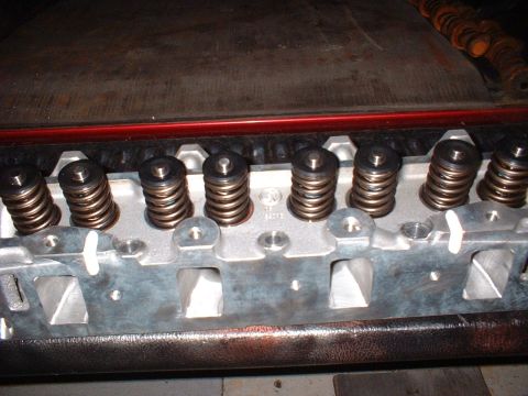 1968 Ford Galaxie - This is a close-up view of an engine's cylinder head, showing the valve springs and associated components.