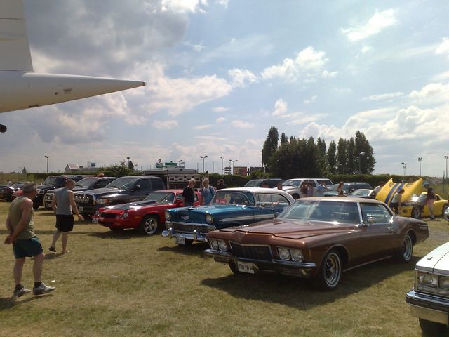 Brown 1973 coupe with chrome accents and a vinyl roof