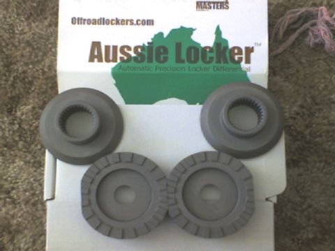 1989 Ford Bronco - Aussie Locker automatic precision locker differential parts are displayed on their packaging.