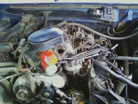 1994 Ford F-250 - Picture of my 5.8 in the middle of a water-pump replacement.