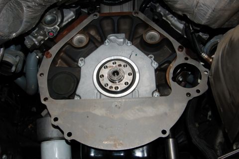 2007 Ford Mustang - Close-up of an engine block, focusing on the flywheel and associated components.