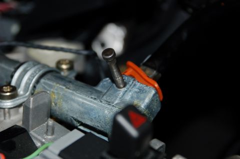 2007 Ford Mustang - Detail of an interior mechanical component, possibly from a car's steering column or shifter.