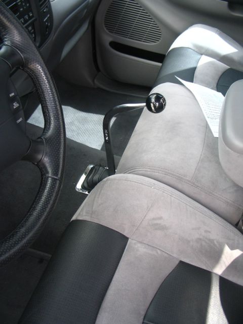 2007 Ford Mustang - Interior shot showing a custom shifter and steering wheel, likely from a truck.