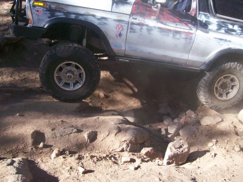 1978 Ford Bronco - This 1978 Ford Bronco navigates a challenging rocky trail, demonstrating its off-road capabilities.