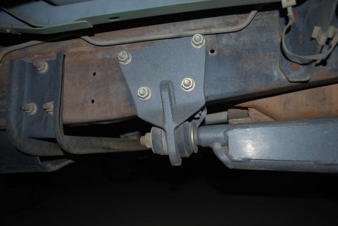 1996 Ford Bronco - Underside view of vehicle chassis showing suspension mounting bracket and frame details.