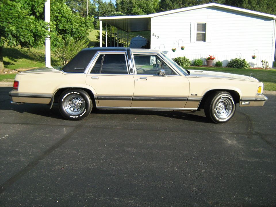 1988 Mercury Grand Marquis side view, tan with black roof