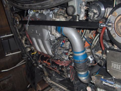 1993 Ford Probe - Custom engine modifications are visible in this engine bay, prominent intake piping.