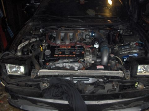 1993 Ford Probe - Engine bay view showing the V6 DOHC 24-VALVE engine and associated components.