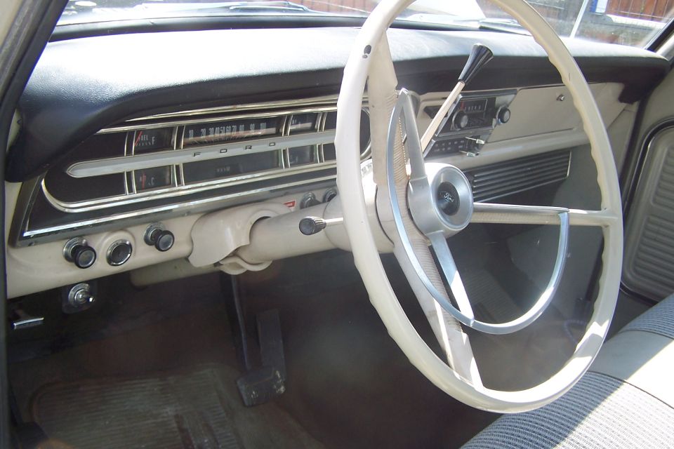 dashboard and steering wheel of an old Ford truck