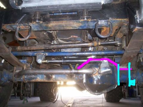 1982 Toyota 4Runner - Undercarriage view of a vehicle's suspension and steering components, with markings indicating modifications or measurements.