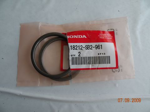 1994 Acura Integra - A Honda gasket part is shown in its original packaging with a part number and quantity.