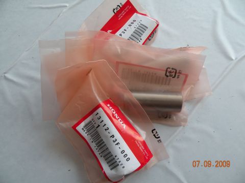 1994 Acura Integra - Genuine Honda parts are shown in their original packaging, with part numbers visible on the labels.