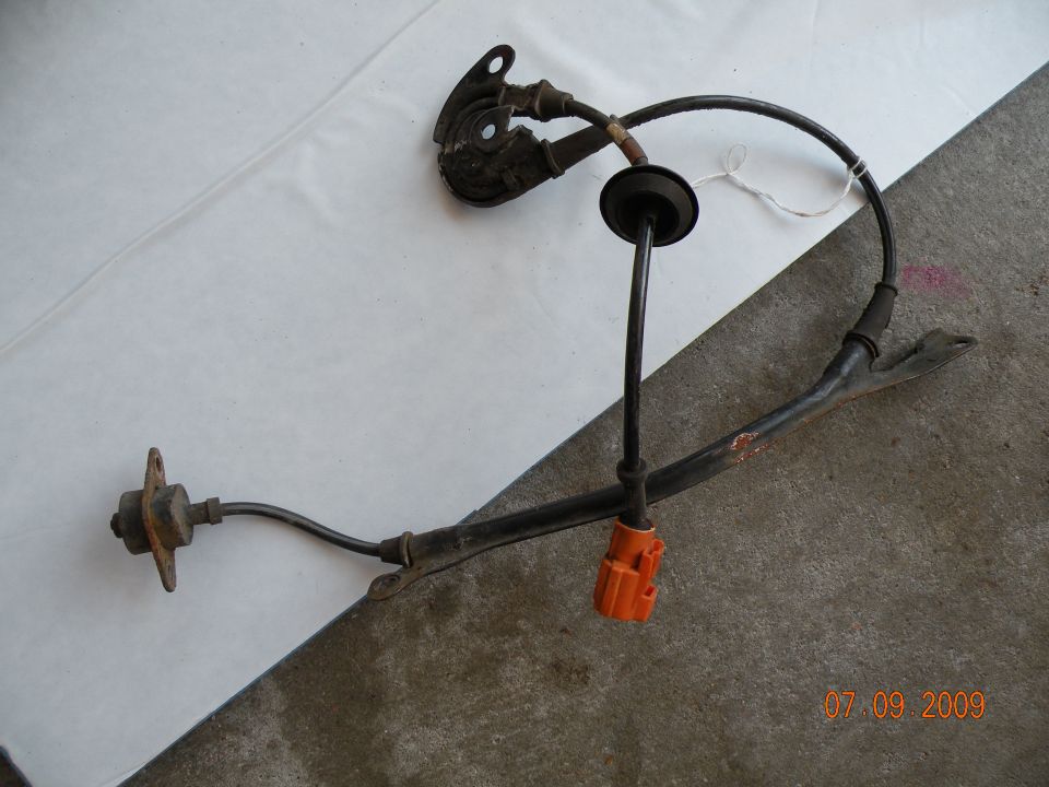 ABS speed sensor assembly with orange connector and mounting bracket