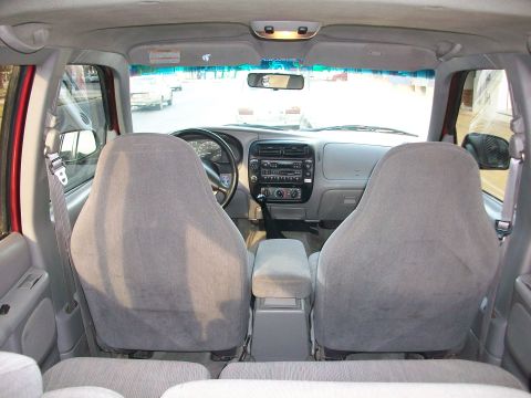1996 Ford Explorer - The interior of a 1996 Ford Explorer is shown from the back seat, looking forward.
