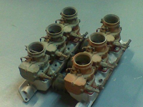 1974 Ford Ranchero - Dual quad carburetor setup on an intake manifold, likely for a V8 engine.