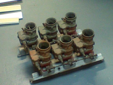 1974 Ford Ranchero - A six-carburetor intake manifold assembly is shown, likely for a performance engine build.