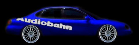 1998 Ford Taurus - Digitally rendered side profile of a blue Ford Taurus sedan on a black background, lowered over large multi-spoke chrome wheels. Large whit…