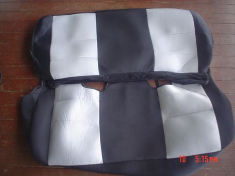 2005 Ford Excursion - A black and white striped seat cover is shown, likely for a vehicle interior.
