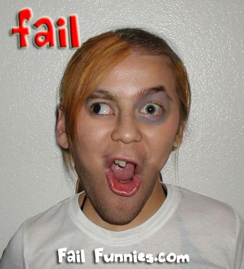 2000 Mercury Grand Marquis - A person with a black eye and a distorted face appears in this humorous photo with the word 'fail' visible.