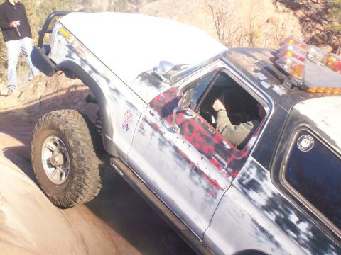 1978 Ford Bronco - This modified 1978 Ford Bronco navigates challenging off-road terrain.