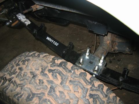 1992 Ford Mustang - Leaf spring assembly with part number WH1132 is visible next to a tire.