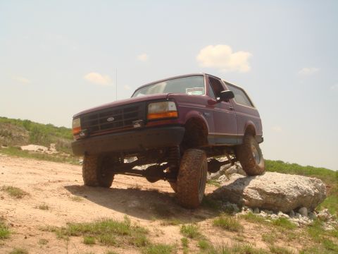 1992 Ford Bronco - This 1992 Ford Bronco is shown navigating a rocky terrain.