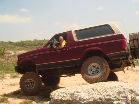 1992 Ford Bronco - This 1992 Ford Bronco is navigating a rocky trail with its driver behind the wheel.