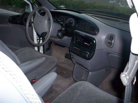 1985 Ford Bronco - Interior view of a minivan, including the dashboard and seats.
