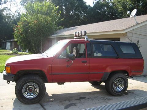 1987 Toyota 4Runner - This second-generation Toyota 4Runner, likely from the mid-1980s, is shown in profile with its distinctive body lines and aftermarket roof…
