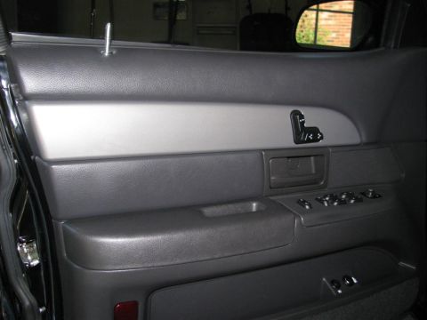 2003 Mercury Marauder - Driver's side complete, with new door pins and bezels.