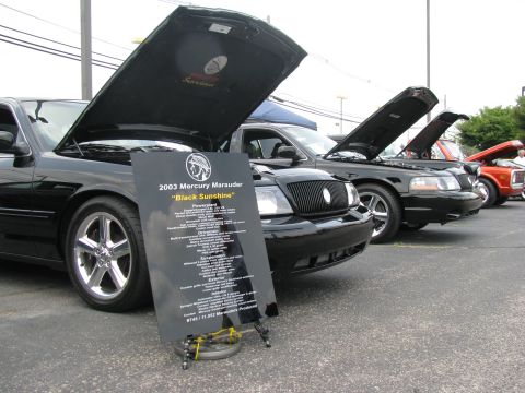 2003 Mercury Marauder - A 2003 Mercury Marauder is shown with its hood open and a detailed information board in front.