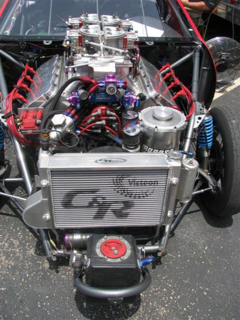 2003 Mercury Marauder - Custom engine bay with a large Visteon radiator and dual carburetors is visible.