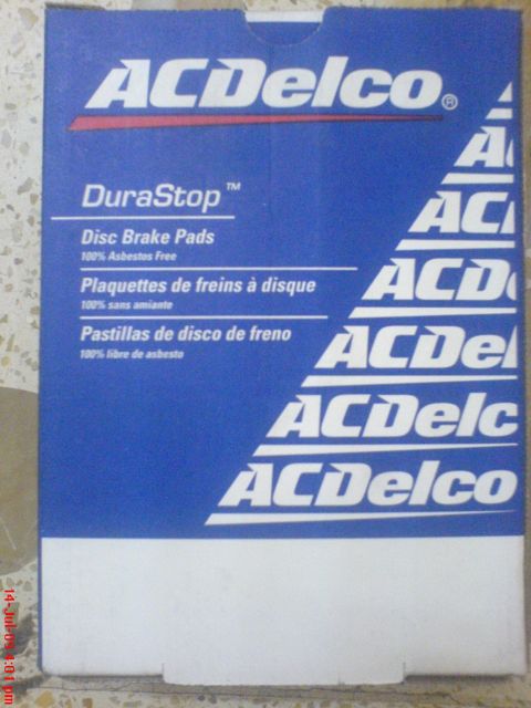 1992 Ford Crown Victoria - A blue and white ACDelco DuraStop disc brake pad box photographed on a terrazzo floor, with the label reading "Disc Brake Pads, 100% Asbest…