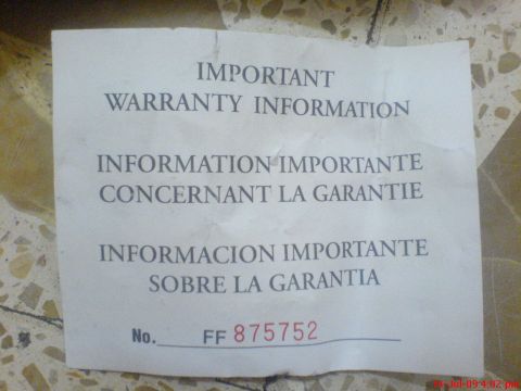 1992 Ford Crown Victoria - A document detailing important warranty information in multiple languages is shown.
