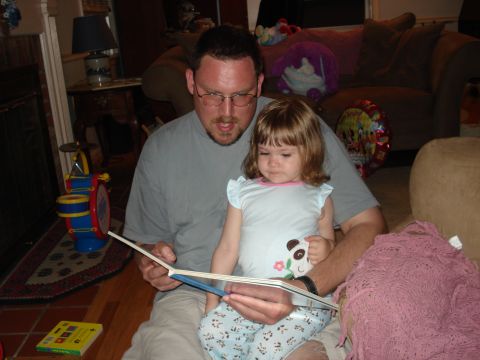 2000 Ford Crown Victoria - Daddy reading Mia a book at bedtime.