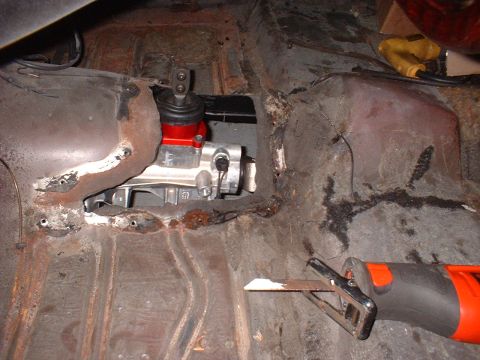 1970 Ford Torino - This shot shows the TKO 600 bolted in but the trans case is hitting in several locations and the shifter handle is in the center of the hum…
