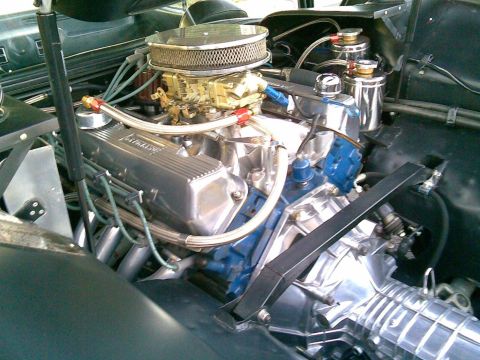 1972 Ford Ranchero - The engine bay features a modified V8 with performance parts and braided hoses.