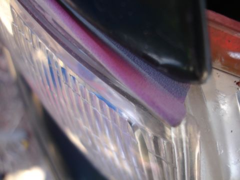 1993 Ford Taurus - Detail of the clear corner section on a 1993 Ford Taurus headlight.