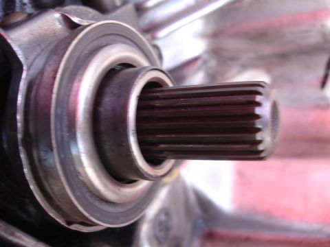 1992 Ford Taurus - A close-up view of a splined shaft and its associated bearing, likely part of a transmission or drivetrain component.